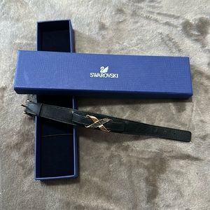 Swarovski Men’s Bracelet. Black belt with gold and black style. Hardly worn.